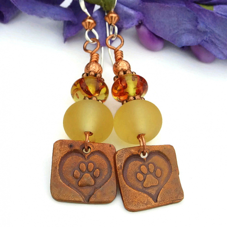 Unique dog paw print and heart artisan earrings.